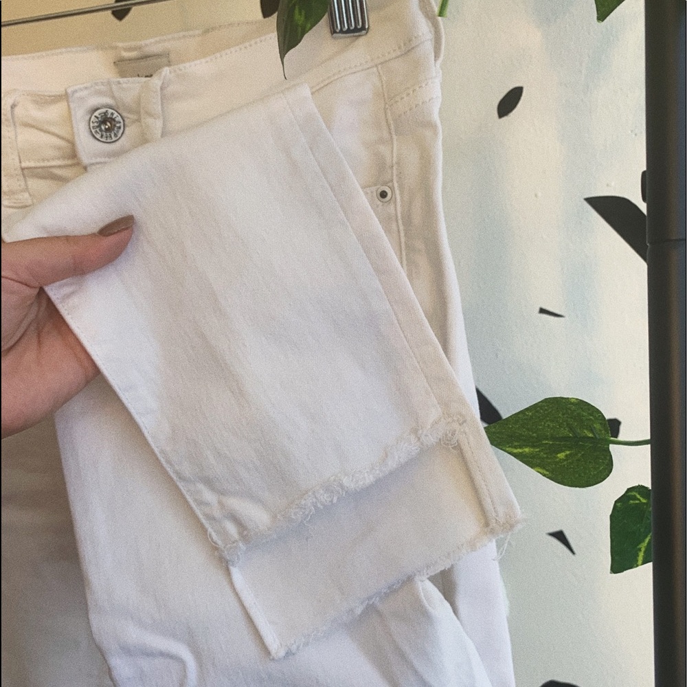 Never worn raw hem white skinny jeans